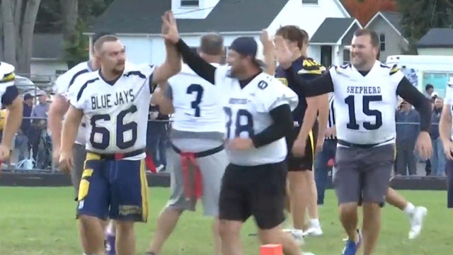 Homecoming game pits kids versus dads