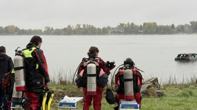 Partially submerged SUV removed from Bowles Lake in Littleton