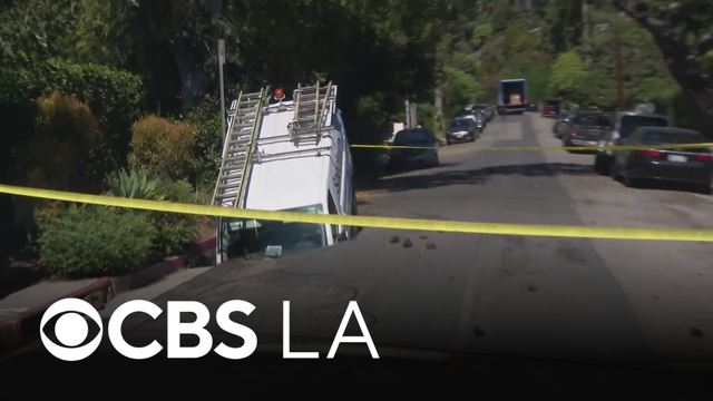 Sinkhole swallows Spectrum van in Los Feliz
