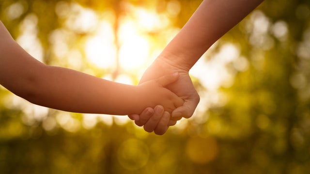 Mother's and a child hands 