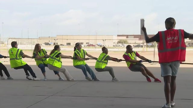American Airlines employees pull jet for charity in Grapevine