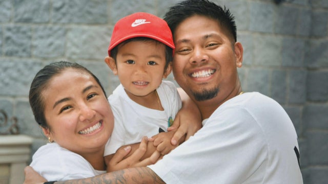 Monica Ryadi with her son and husband 