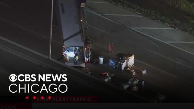 Semi truck carrying hydrochloric acid rolls over on I-90 prompting hazmat response in McHenry County
