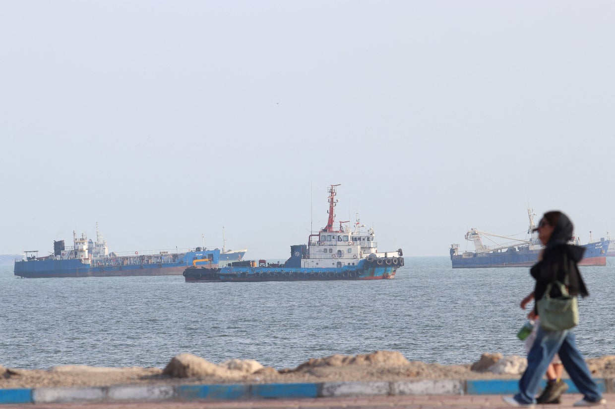 Vessels are seen in the Strait of Hormuz from the beach of Bandar Abbas, Iran, Oct. 13, 2026. Razieh Poudat/ISNA/WANA/REUTERS
