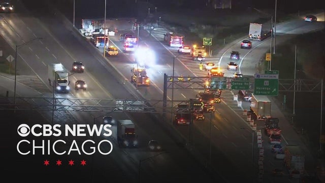 Semi truck carrying hydrochloric acid rolls over on I-90, prompting hazmat