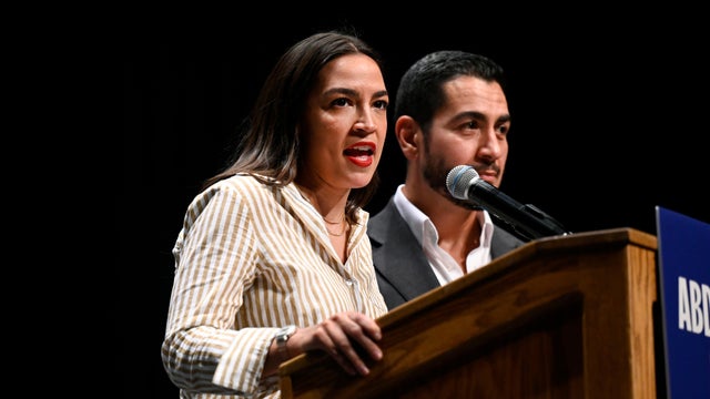 U.S. Rep. Alexandria Ocasio-Cortez, D-N.Y., left, talks about Michigan Democratic U.S. Senate primary candidate Abdul El-Sayed during a campaign rally, Saturday, July 18, 2026, in Detroit. 