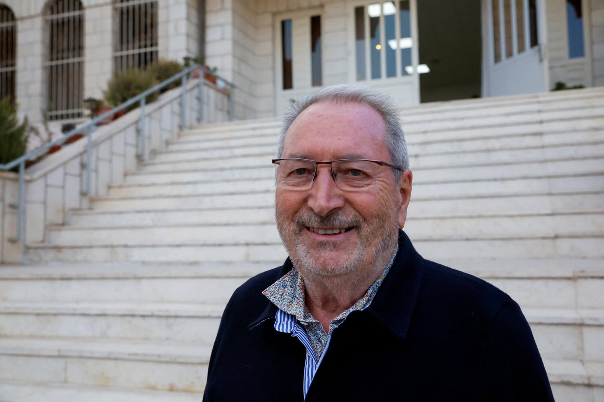 Bernard Baudoux, mayor of Aulnoye-Aymeries, poses for a photograph after he was attacked by militant Israeli settlers 