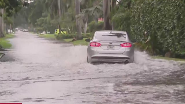 Standing water creates road hazards in parts of South Florida