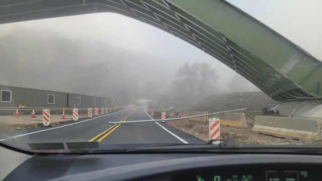 Pole falls off new Pittsburgh bridge, nearly hitting car below
