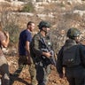 PALESTINIAN-ISRAEL-CONFLICT-WESTBANK-OLIVE-HARVEST-SETTELERS 