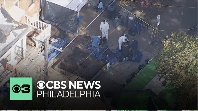 Investigators dig up front yard at alleged "house of horrors" in Olney section of Philadelphia