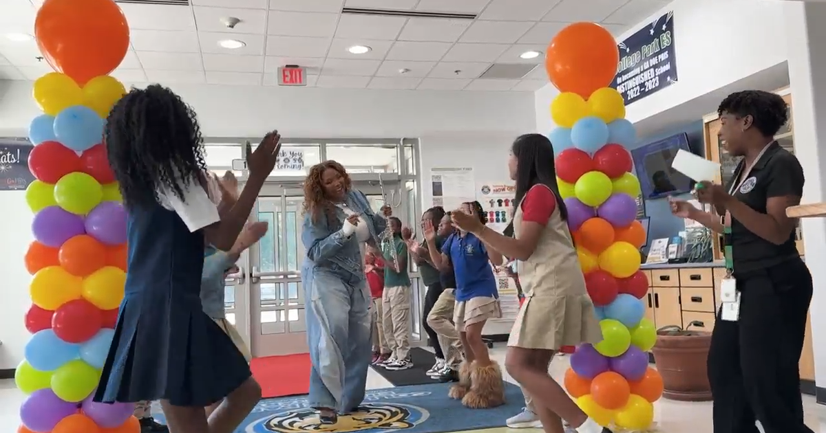 Lizzo encourages students to find their voice during visit to College Park school