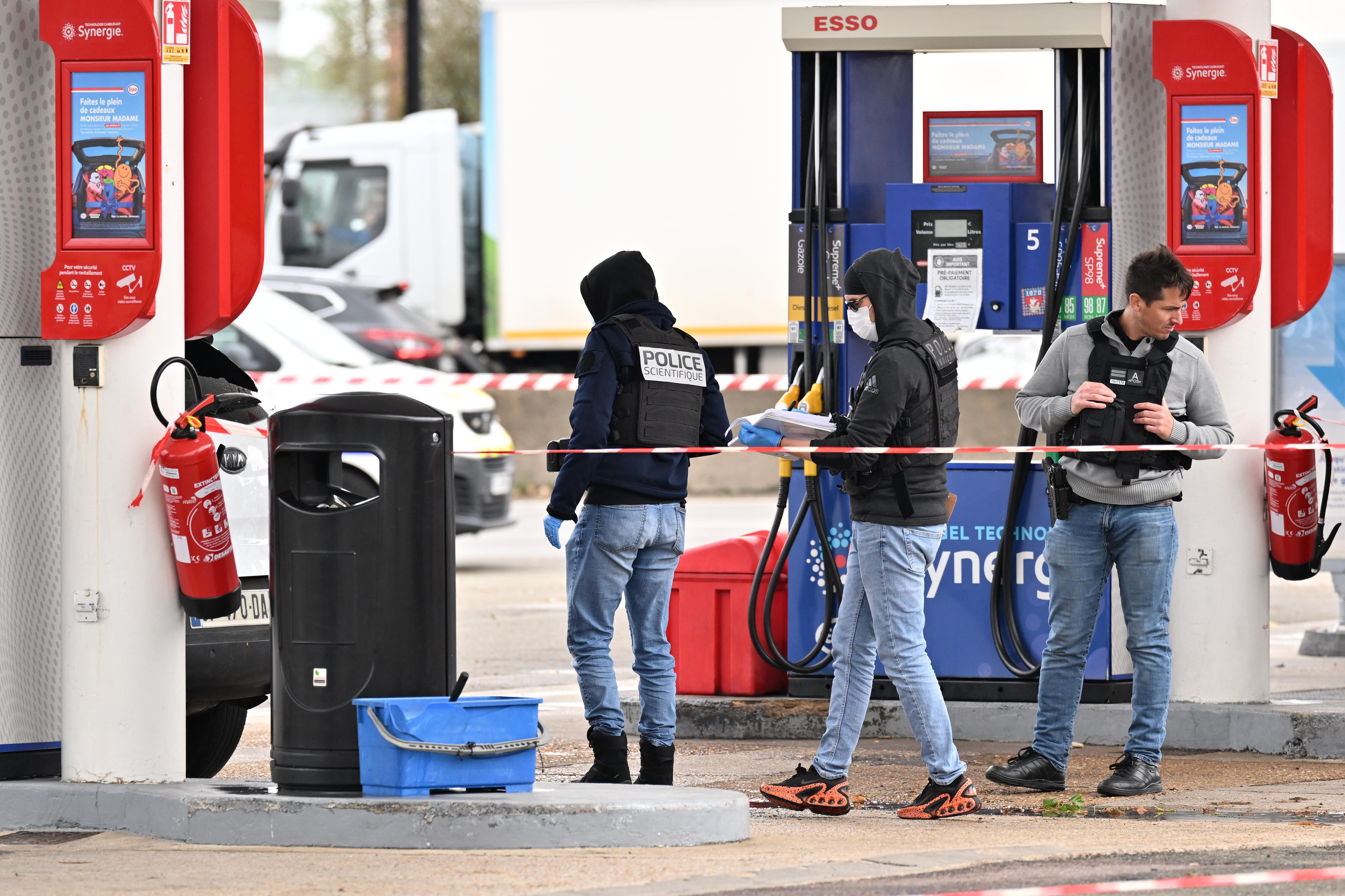 Deadly shooting in Paris suburb may be terrorist act, officials say