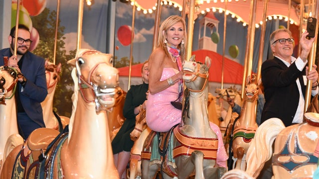 People pose for photos at a gala at the Please Touch Museu, 