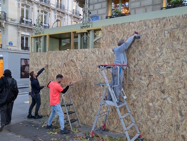 Shops on the Champs-Elysees barricaded ahead of planned protests