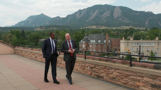 Bill Whitaker and Gov. Polis 