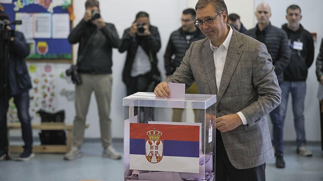 Serbia begins voting in snap parliamentary elections 