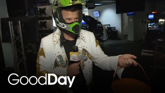 John is going trick-or-treating in the newsroom!