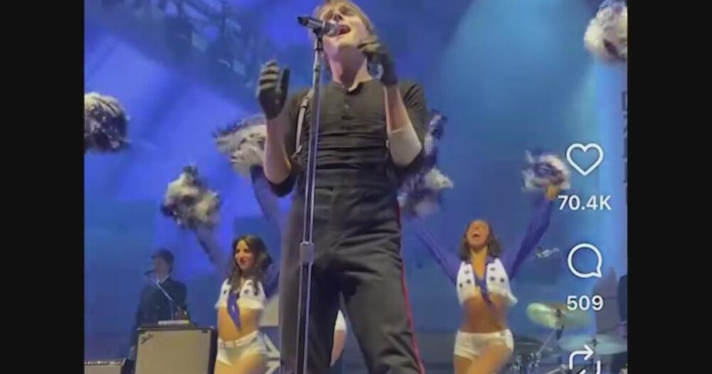 Image from CBS News's coverage: My Chemical Romance faces legal fight over Cowboys cheerleader-inspired costumes