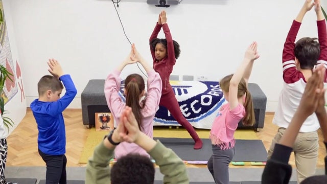 7-year-old yoga instructor sets record