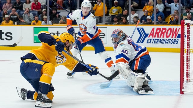 Semyon Varlamov #40 of the New York Islanders makes a save against Nils Hoglander #21 of the Nashville Predators during an NHL game at Bridgestone Arena on October 27, 2026 in Nashville, Tennessee. 