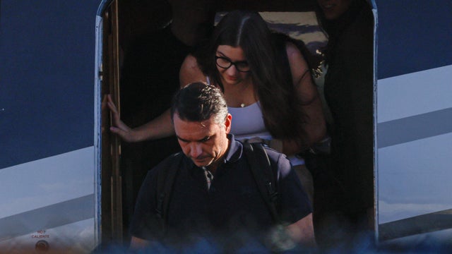 A plane believed to be carrying Brazilian Senator Flavio Bolsonaro arrives at Opa Locka Executive Airport 