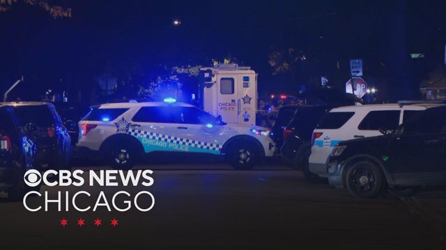 SWAT teams gather outside home in Chicago's Portage Park neighborhood