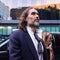 Image from CBS News's coverage: Russell Brand takes the stand at his rape and sexual assault trial